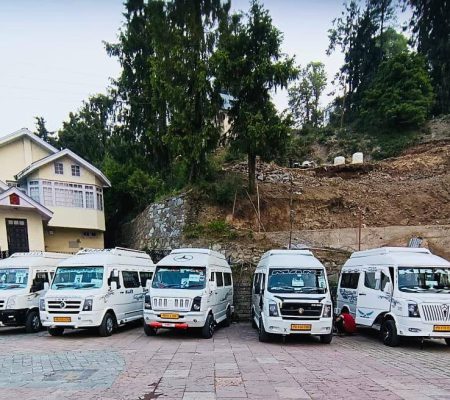 Group of people enjoying a comfortable journey in the spacious Tempo Traveller, provided by Bawa Taxi Services, the best taxi service.